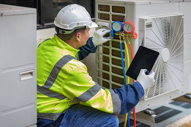 Professional Hvac technician working in Matthews, GA